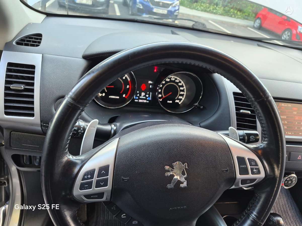 Peugeot 4007 2011 — photo 16