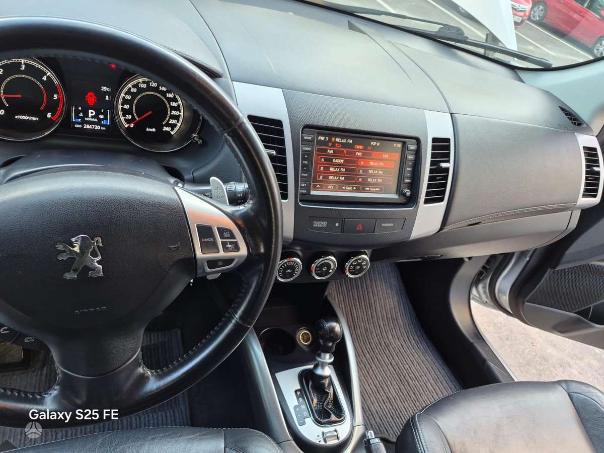 Peugeot 4007 2011 — photo 19