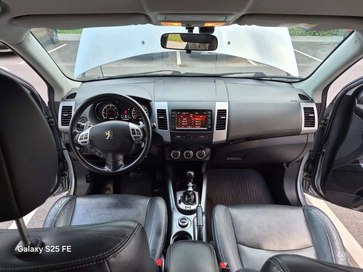 Peugeot 4007 2011 — photo 22