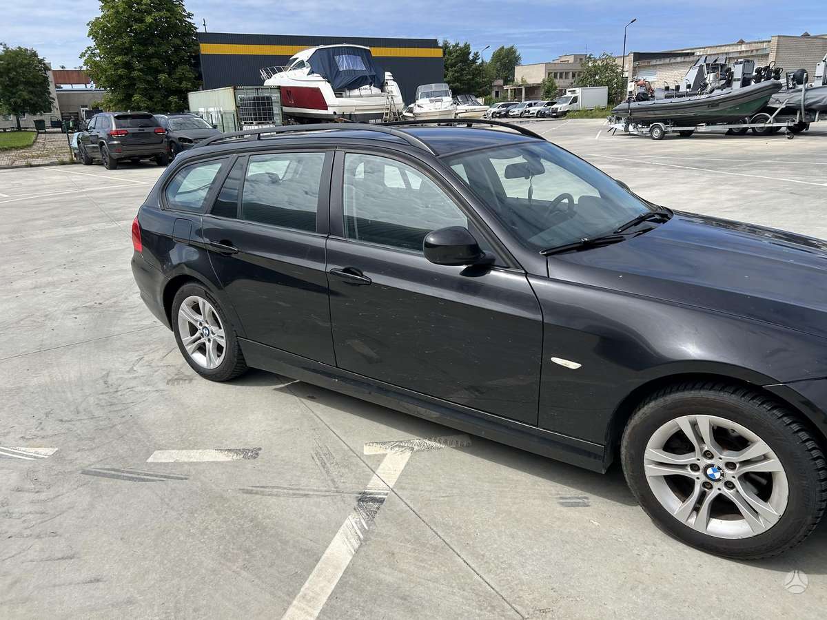 BMW 318 2009 — engine 1995 cm³, 143 HP (105kW)