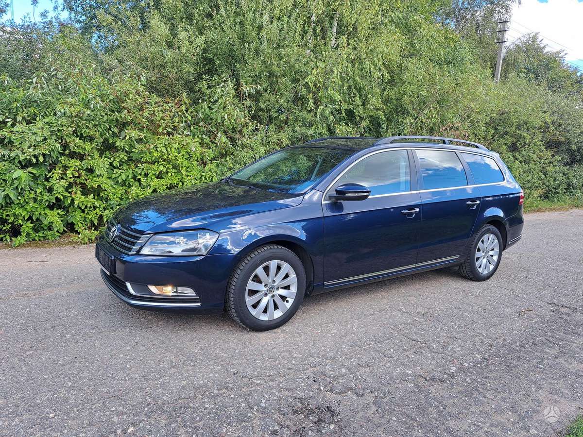 Volkswagen Passat 2014 — вигляд ззаду