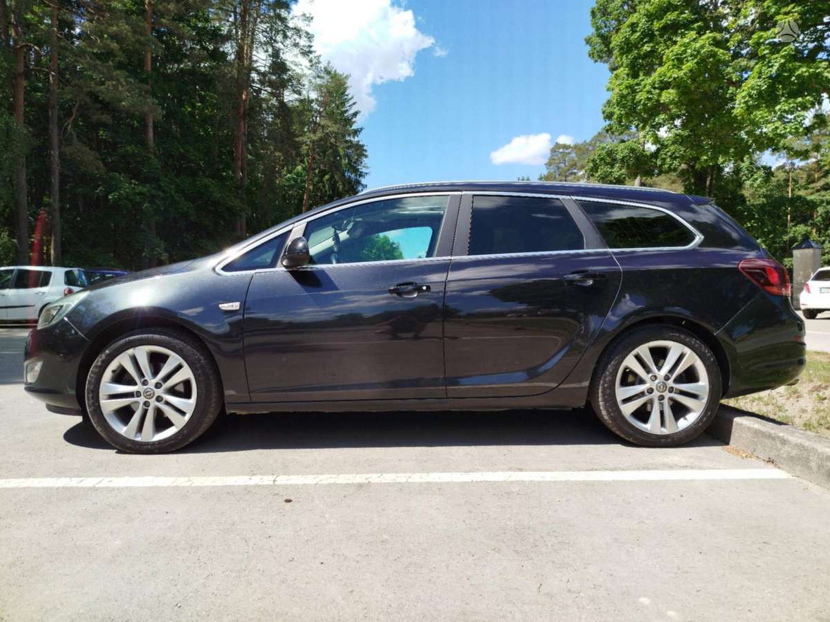 Opel Astra 2012 — photo 14