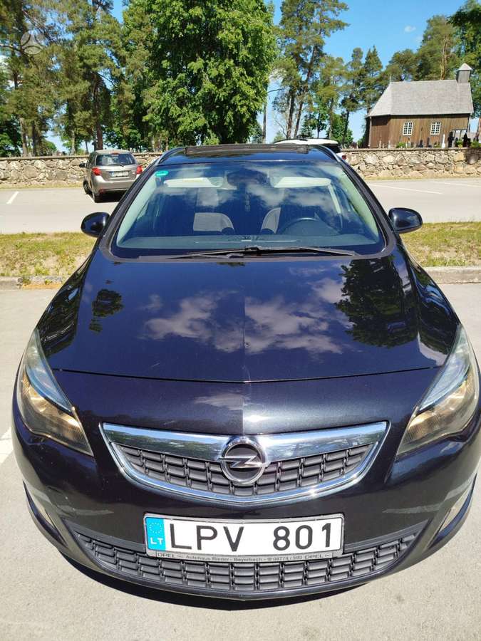 Opel Astra 2012 — engine 1956 cm³, 165 HP (121kW)