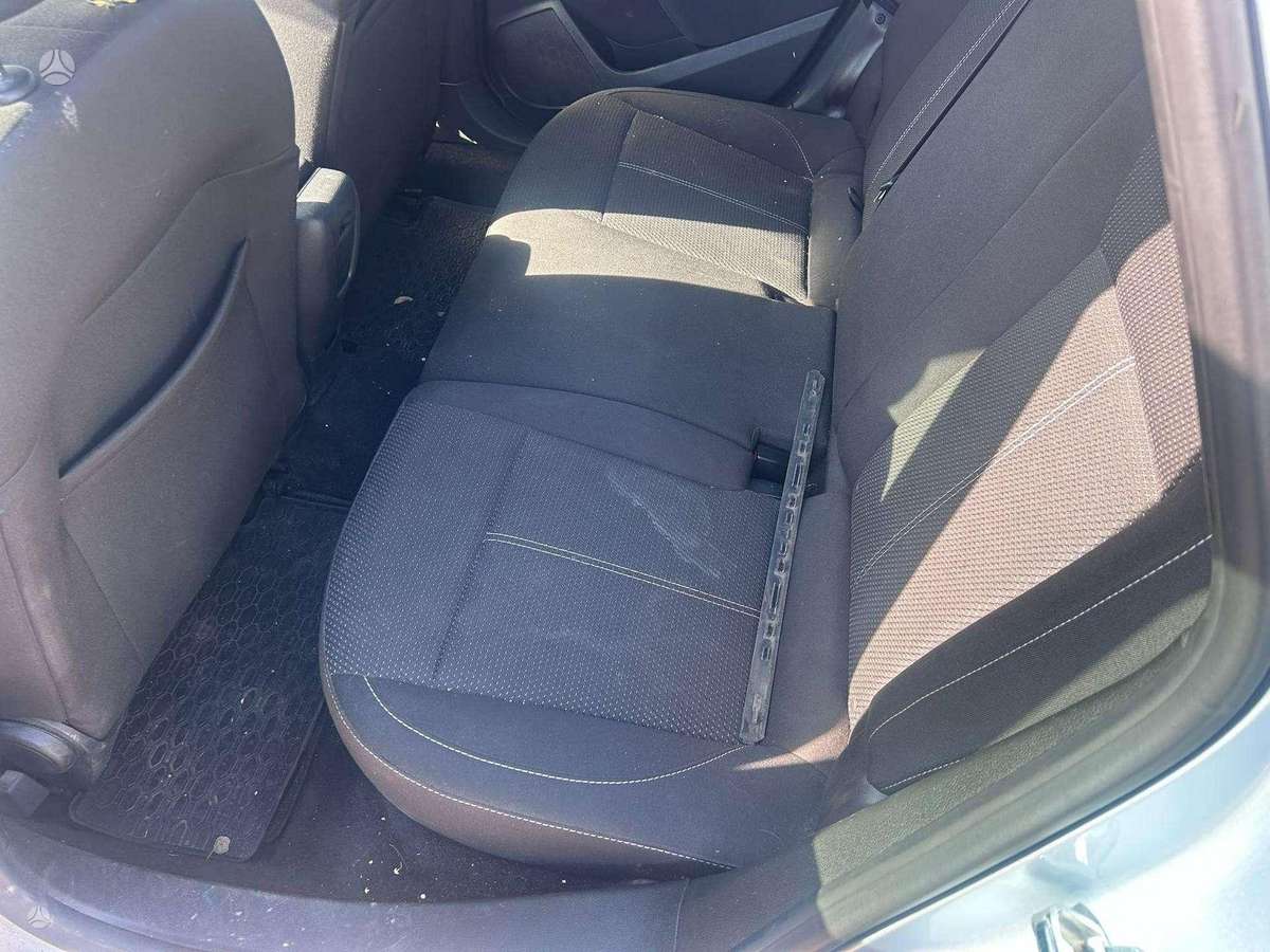 Opel Astra 2014 — photo 14