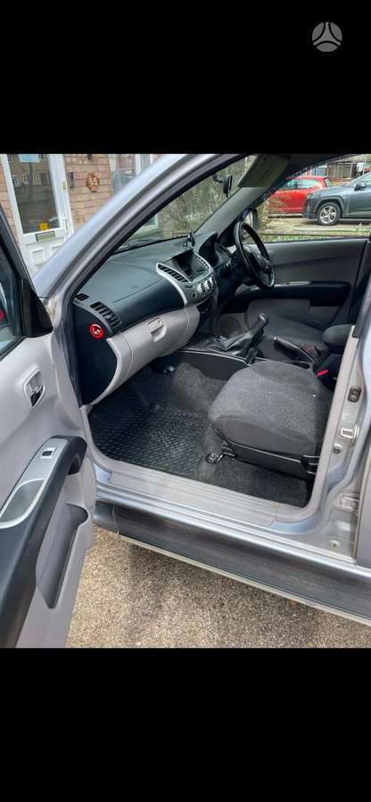 Mitsubishi L200 2012 — photo 10