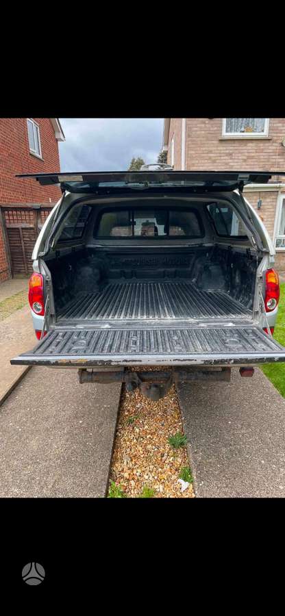 Mitsubishi L200 2012 — photo 7