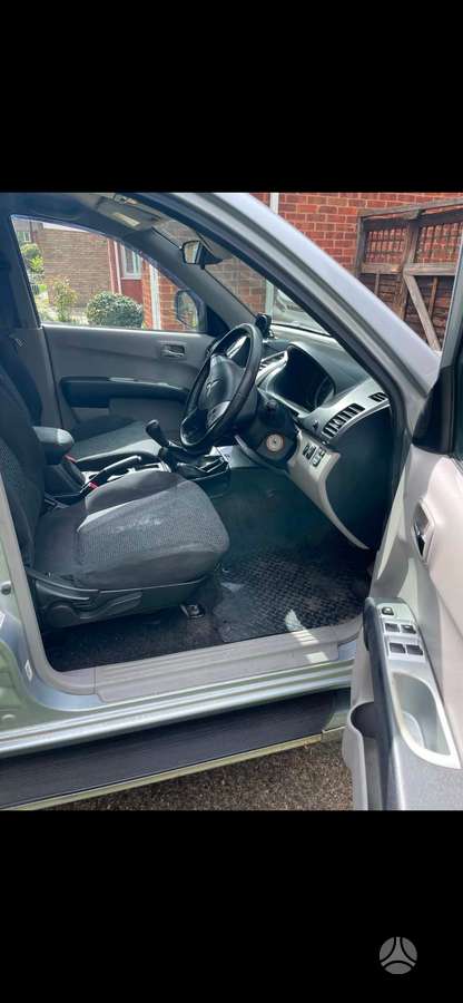 Mitsubishi L200 2012 — photo 9