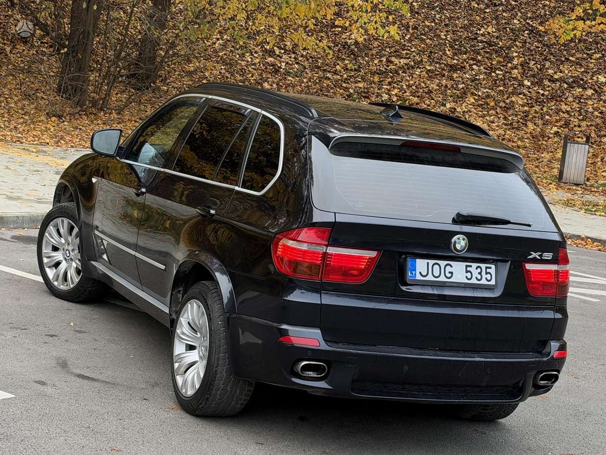 BMW X5 2009 — photo 7