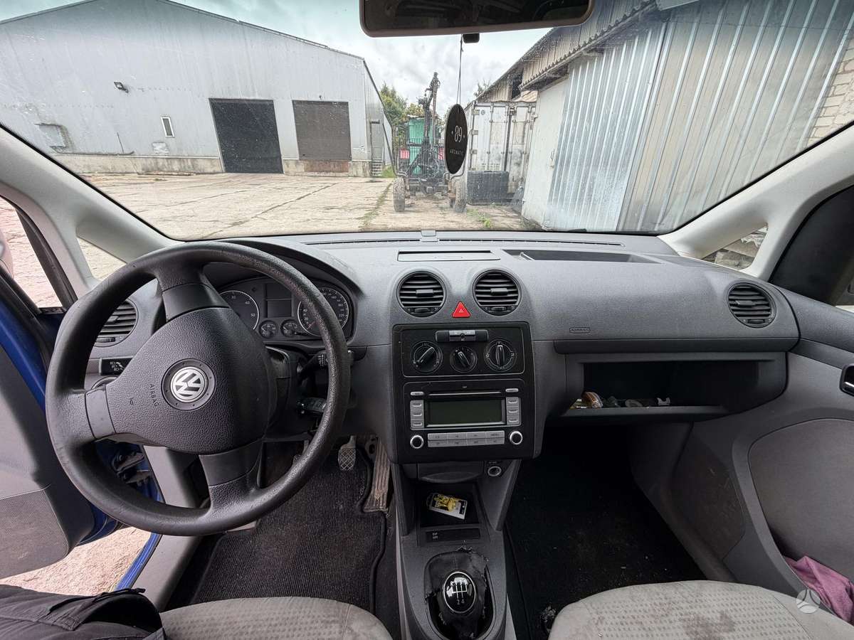 Volkswagen Caddy 2009 — engine 105 HP (77kW)