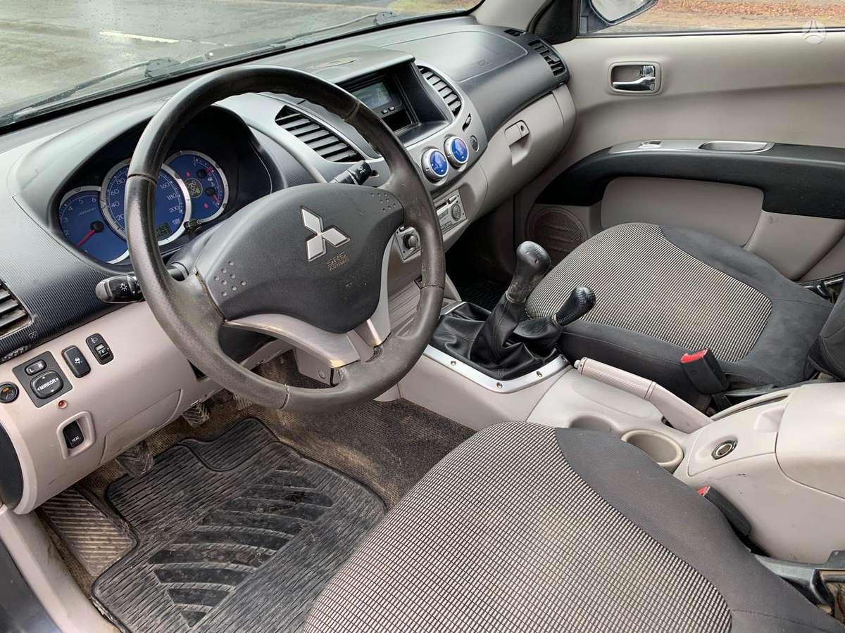 Mitsubishi L200 2007 — photo 12