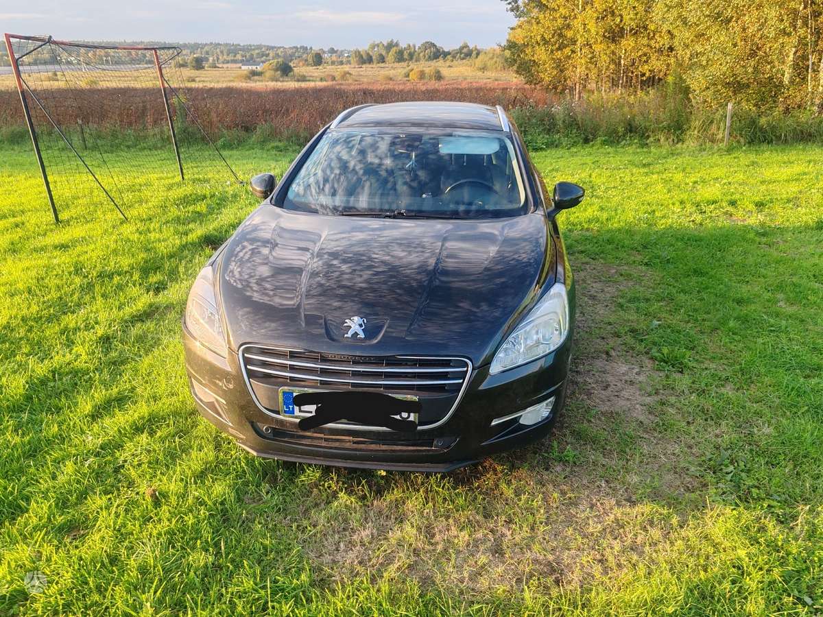 Peugeot 508 2013 — вигляд ззаду
