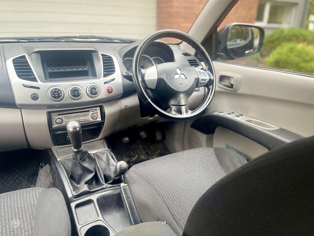 Mitsubishi L200 2011 — фото 17