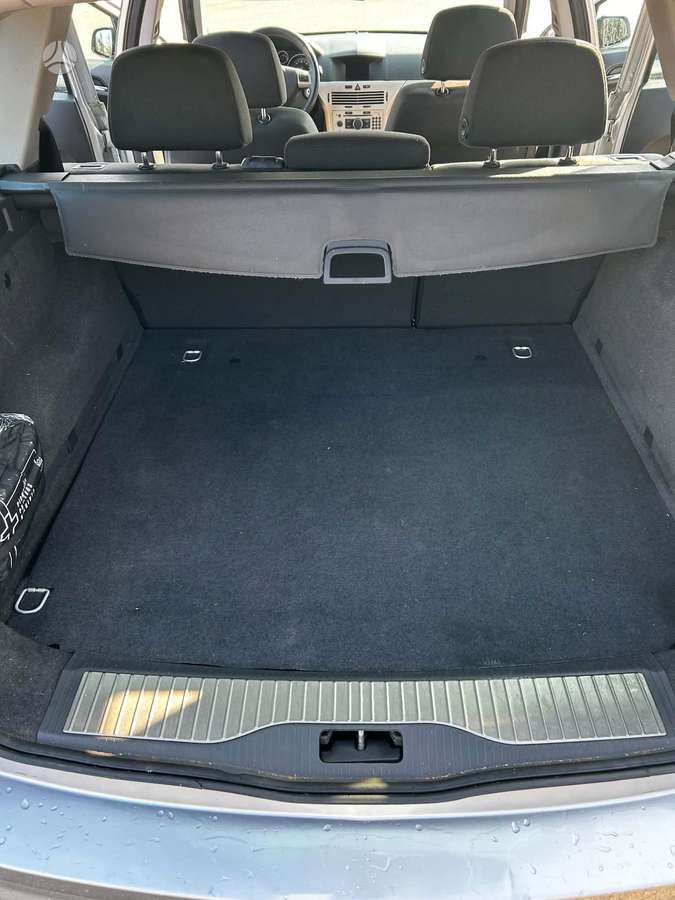 Opel Astra 2008 — photo 13