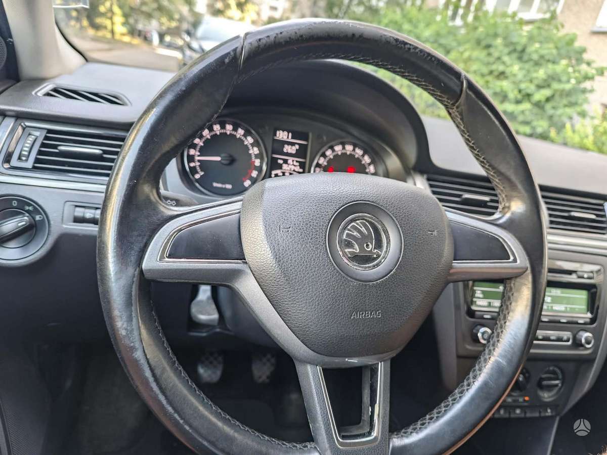 Skoda Rapid 2014 — фото 11