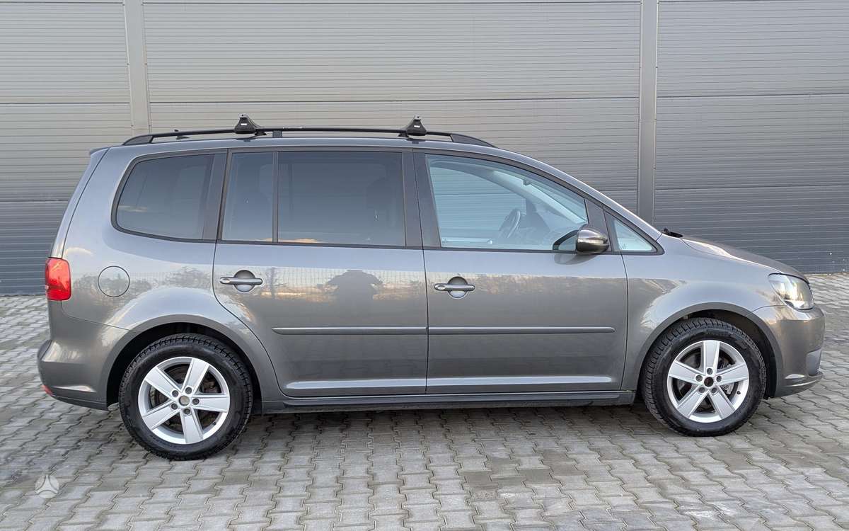Volkswagen Touran 2014 — engine 1598 cm³, 105 HP (77kW)