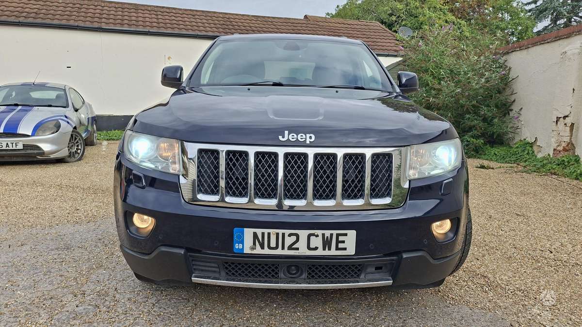 Jeep Grand 2012 — вигляд ззаду