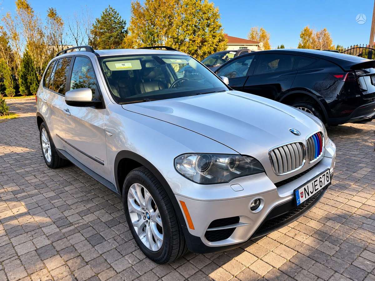 BMW X5 2011 — engine 2993 cm³, 286 HP (210kW)