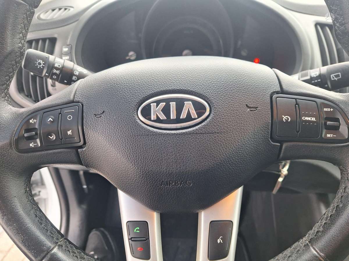 Kia Sportage 2012 — фото 11