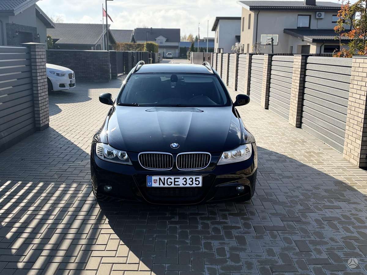 BMW 335 2009 — engine 2993 cm³, 286 HP (210kW)