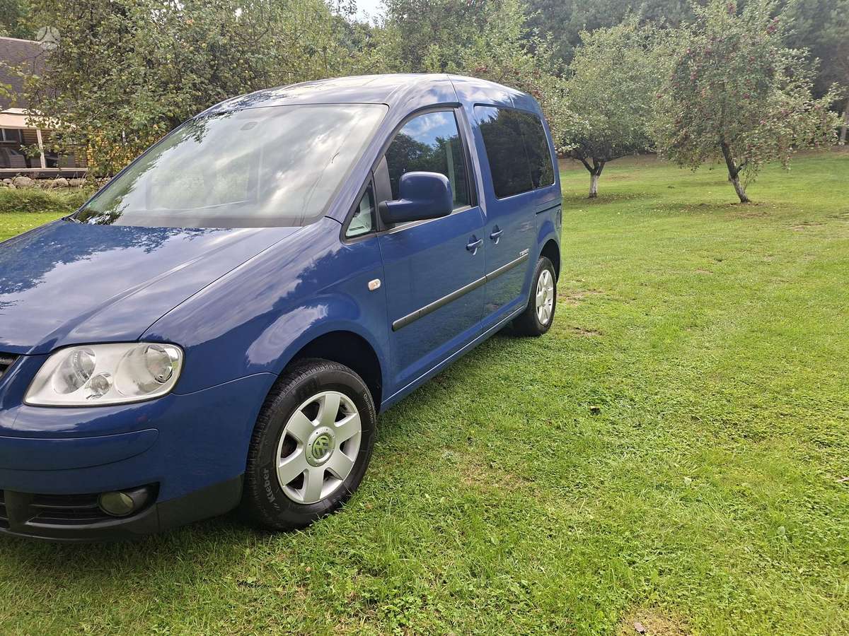 Volkswagen Caddy 2010 — салон