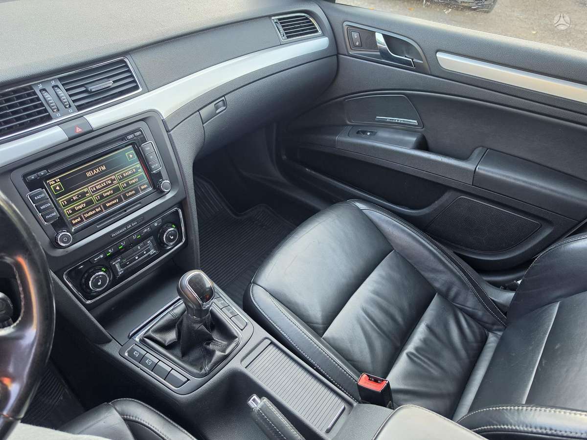 Skoda Superb 2010 — photo 14
