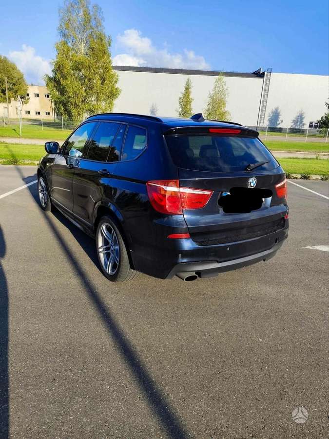 BMW X3 2011 — салон