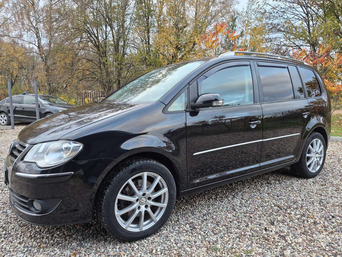 Volkswagen Touran 2007 — двигун 1968 cm³, 170 HP (125kW)