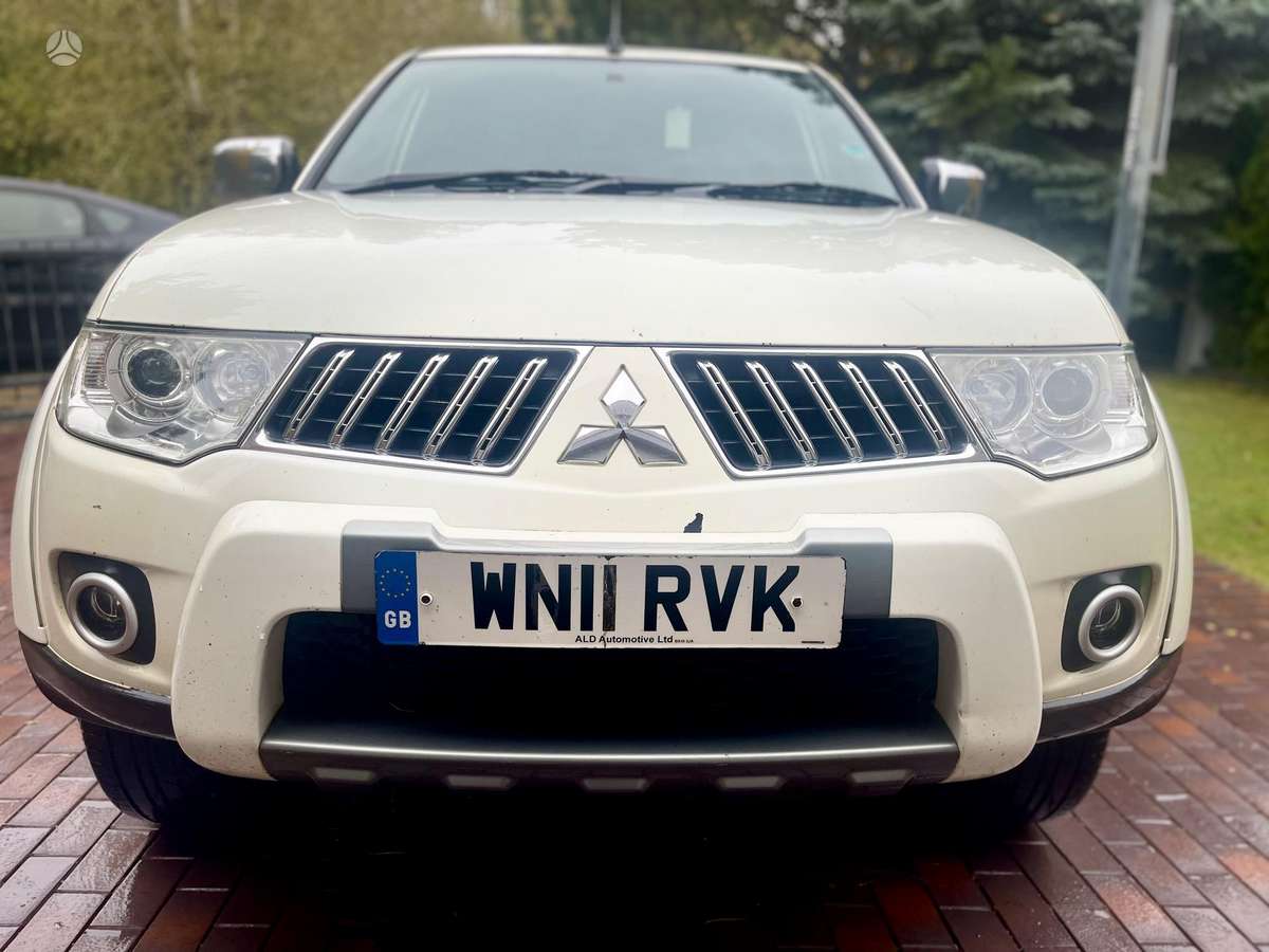 Mitsubishi L200 2011 — вигляд ззаду