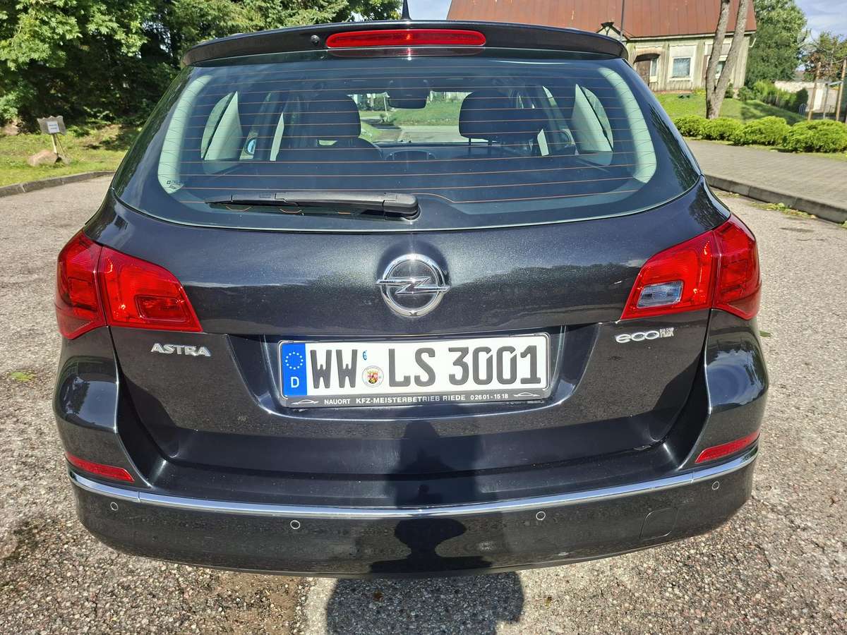 Opel Astra 2013 — engine 1686 cm³, 125 HP (92kW)