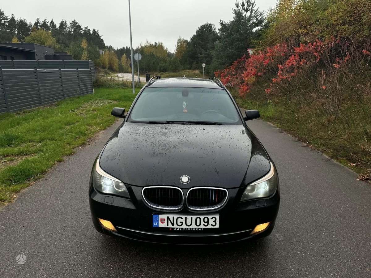 BMW 520 2008 — rear view