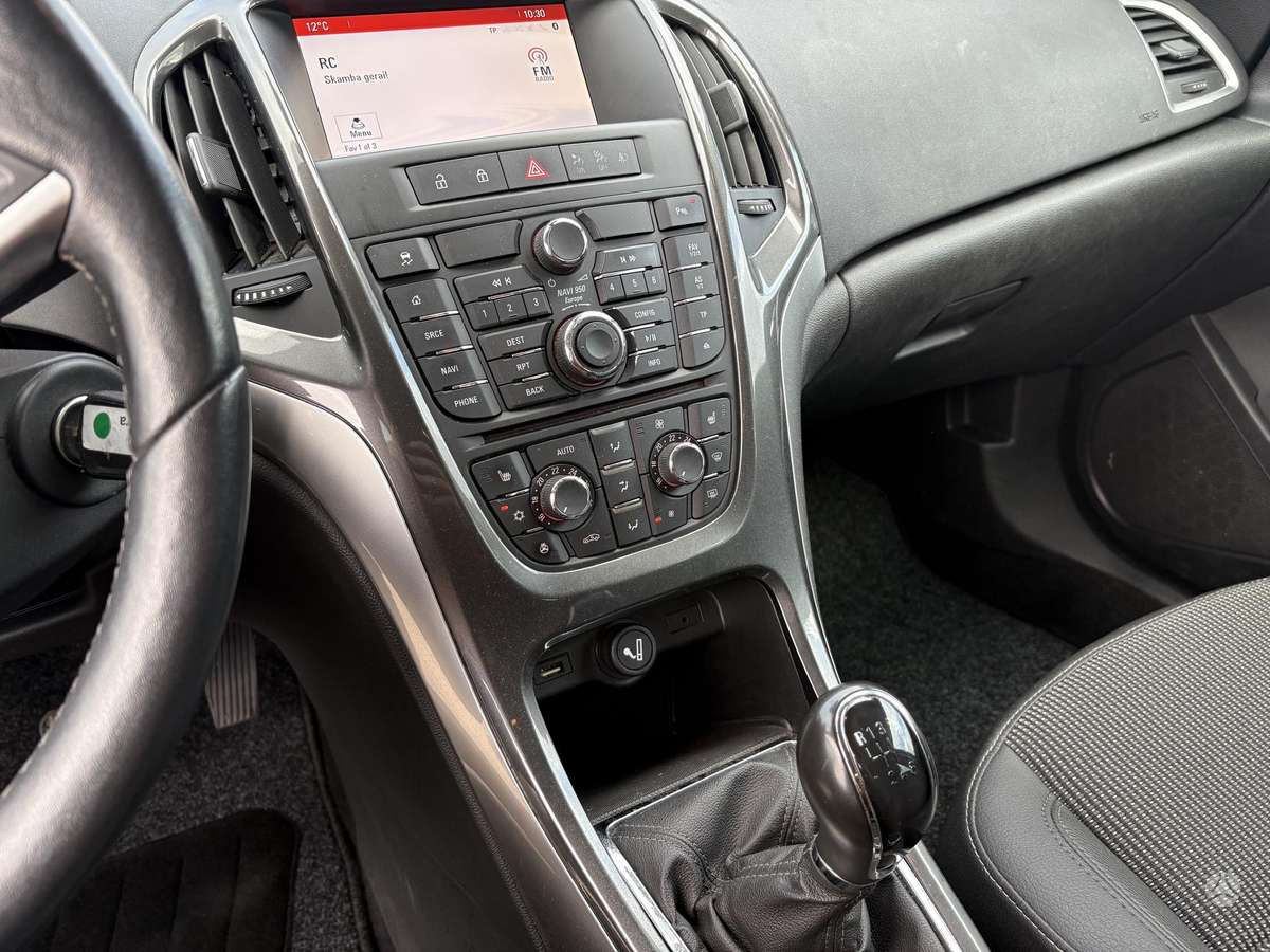 Opel Astra 2014 — фото 14