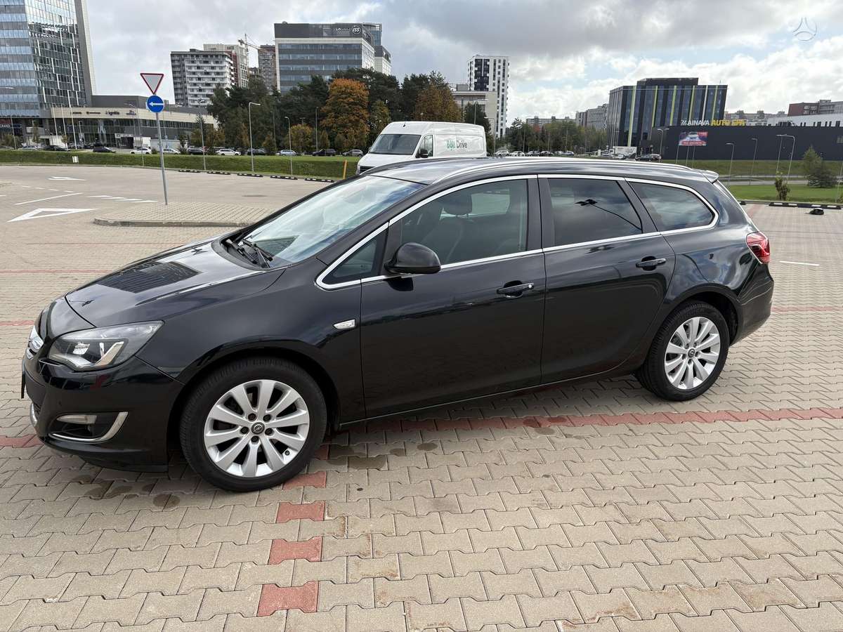 Opel Astra 2014 — фото 6