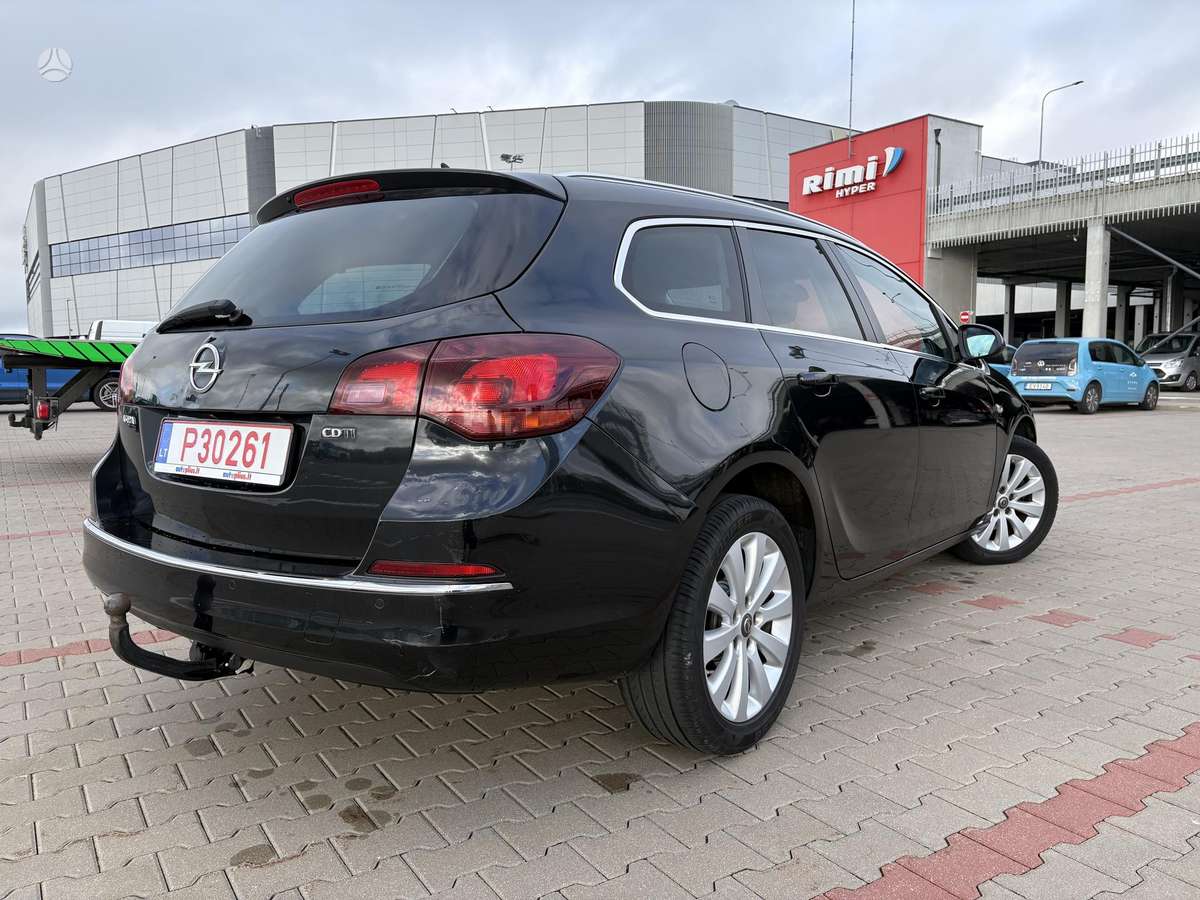 Opel Astra 2014 — фото 7