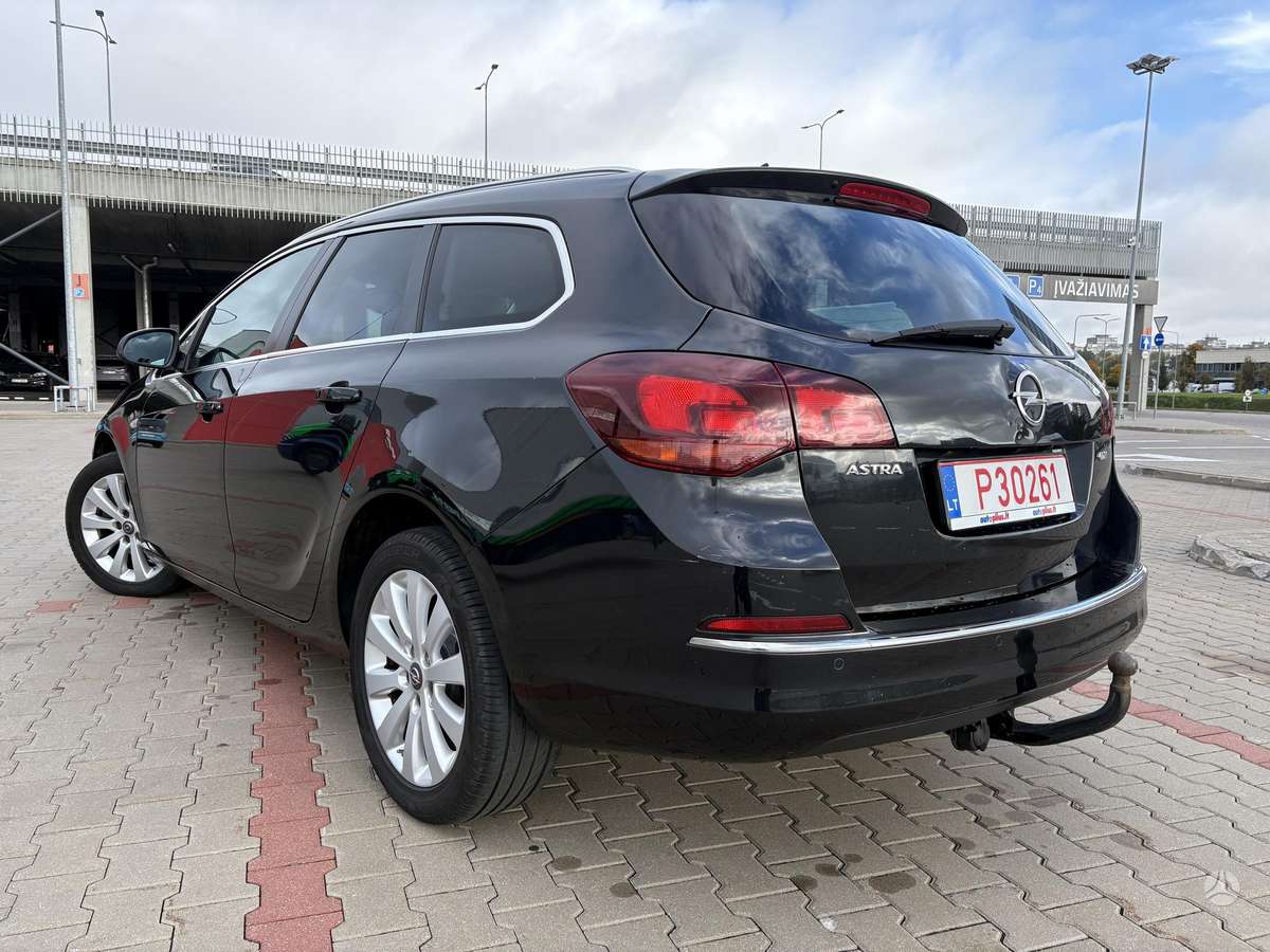 Opel Astra 2014 — фото 8