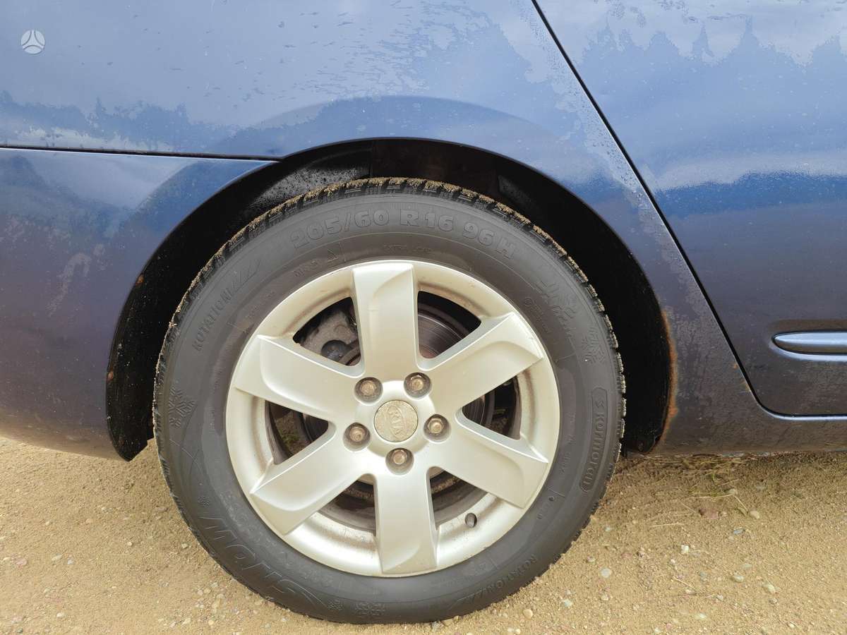 Kia Carens 2007 — photo 8