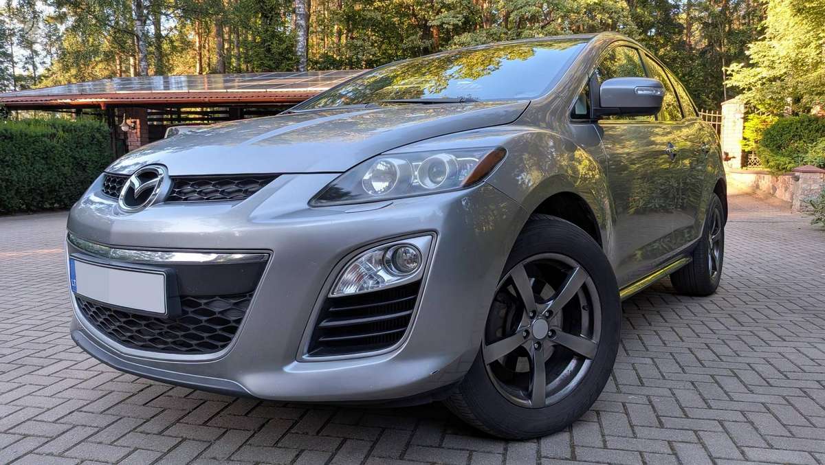 Mazda CX-7 2010 — engine 2184 cm³, 173 HP (127kW)