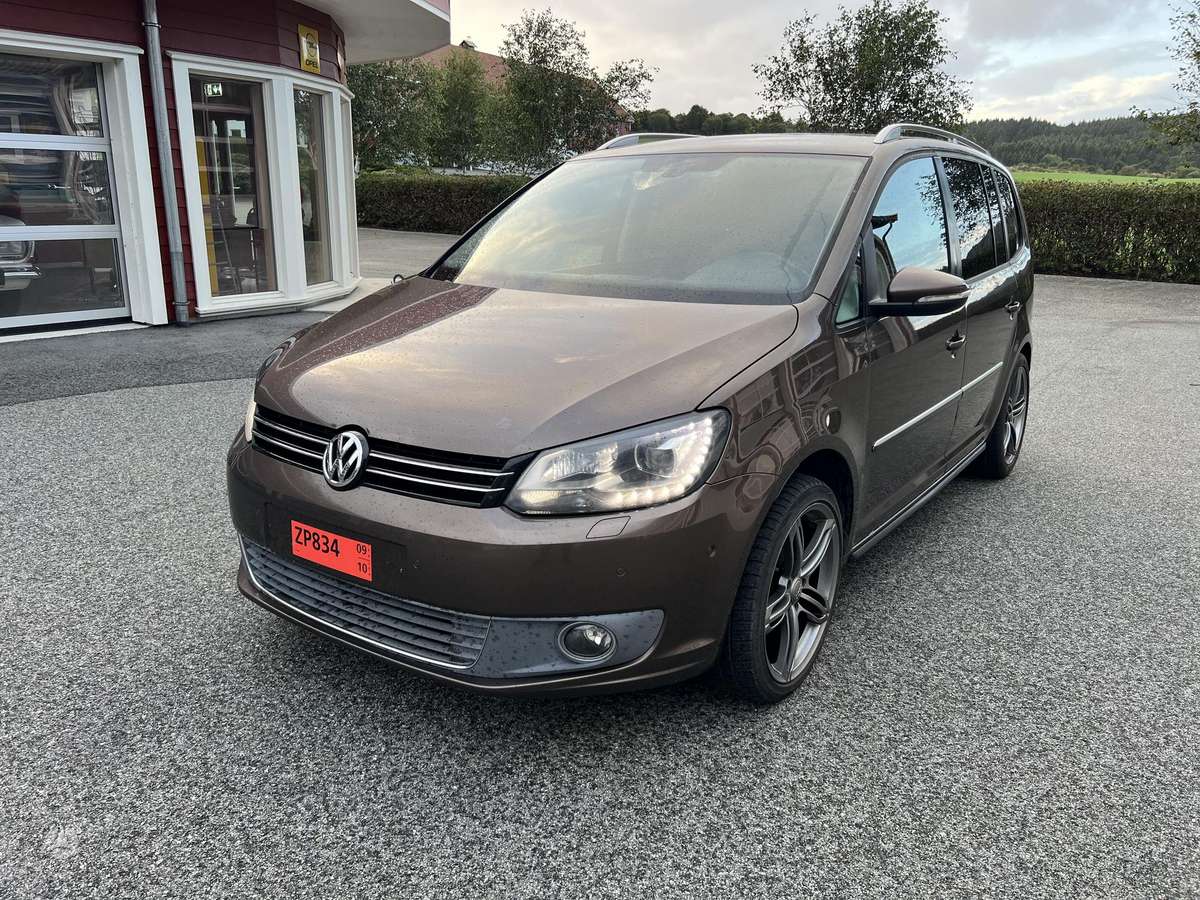 Volkswagen Touran 2011 — photo 40