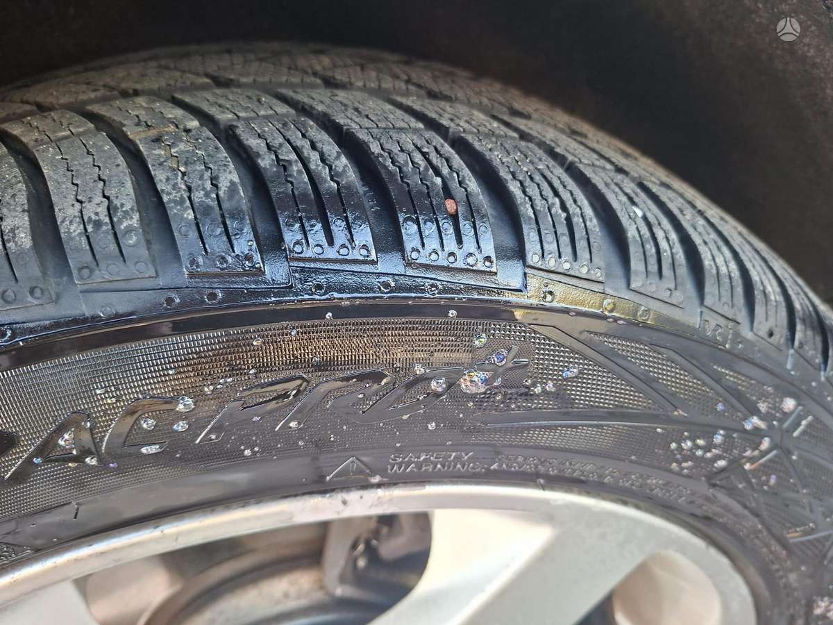 Volvo V70 2009 — photo 15