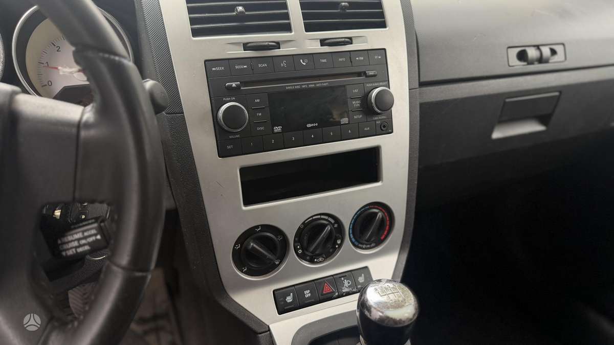 Dodge Caliber 2010 — фото 12