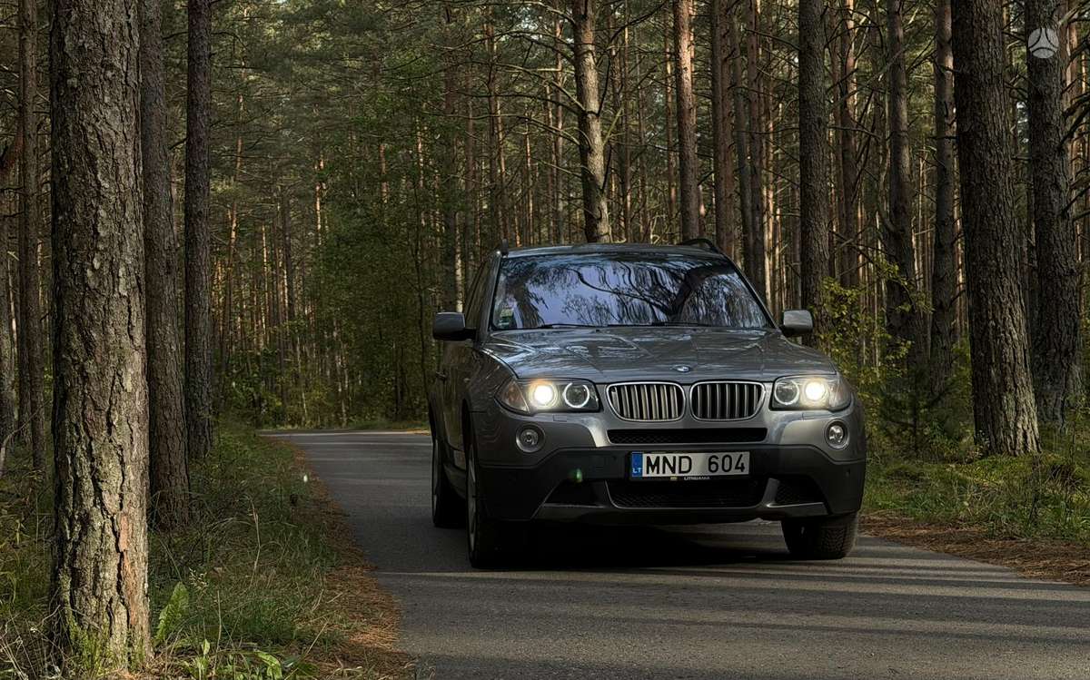 BMW X3 2009 — rear view