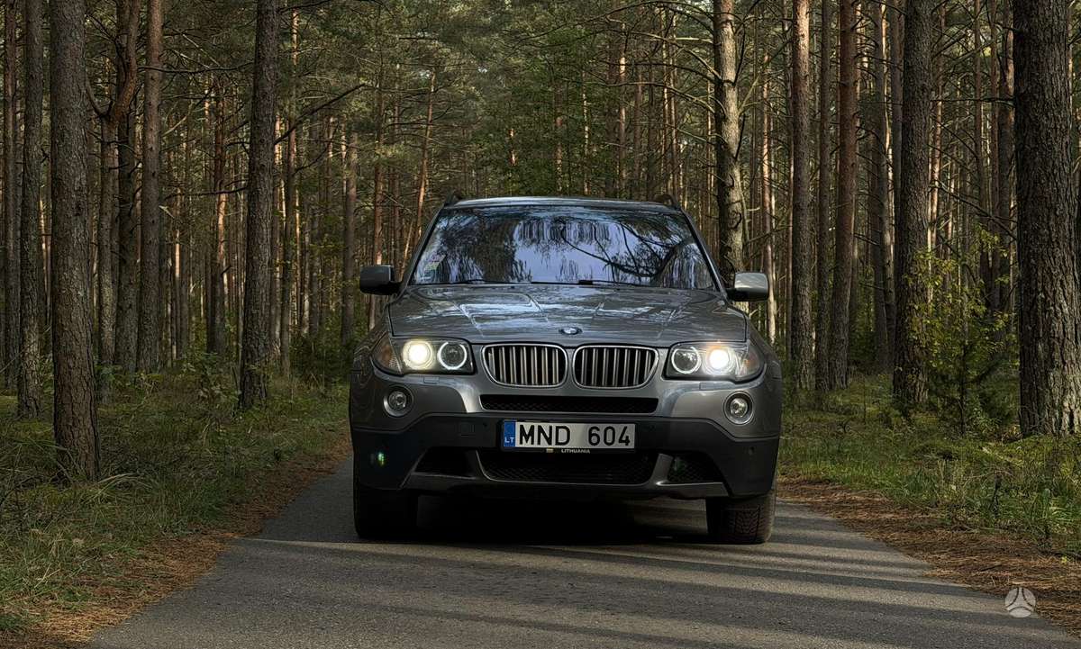 BMW X3 2009 — interior