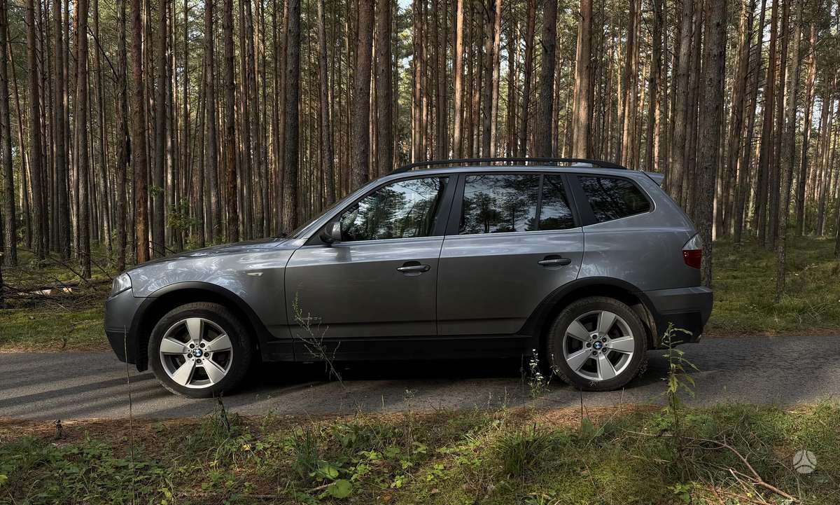 BMW X3 2009 — engine 2993 cm³, 286 HP (210kW)