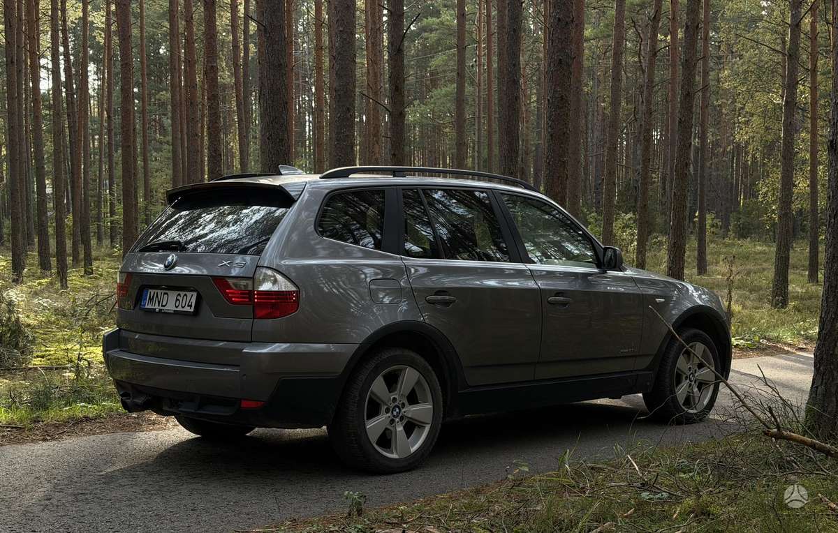 BMW X3 2009 — photo 7