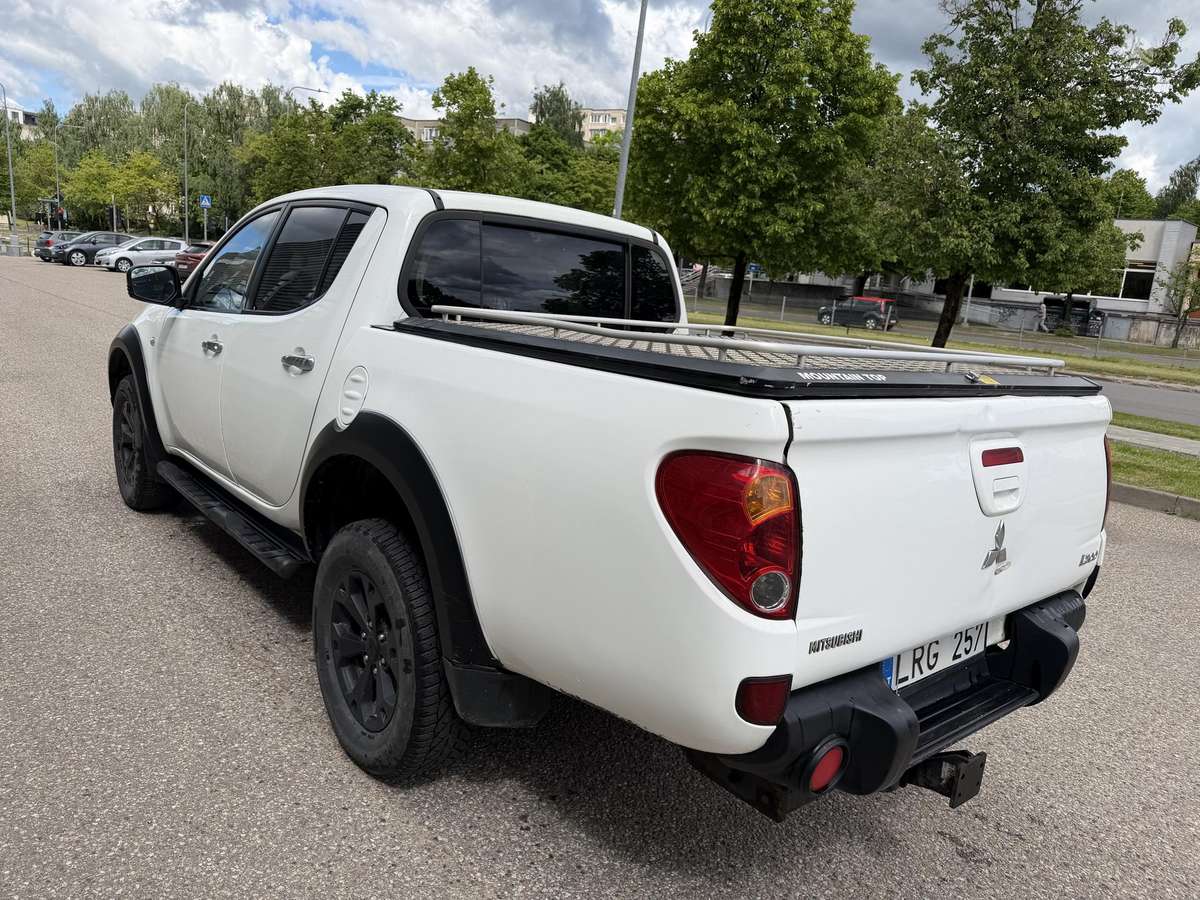 Mitsubishi L200 2012 — photo 10