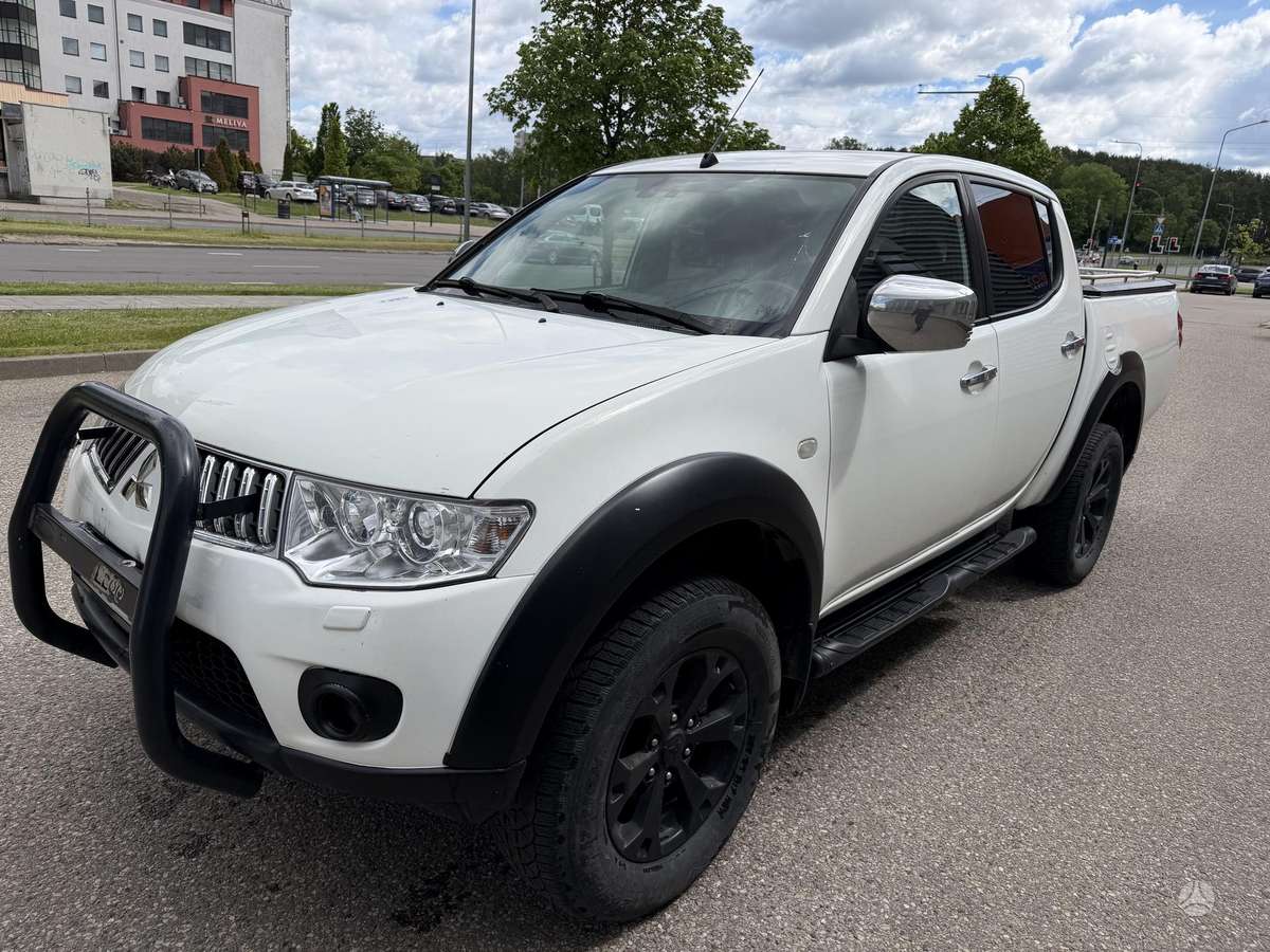 Mitsubishi L200 2012 — photo 11