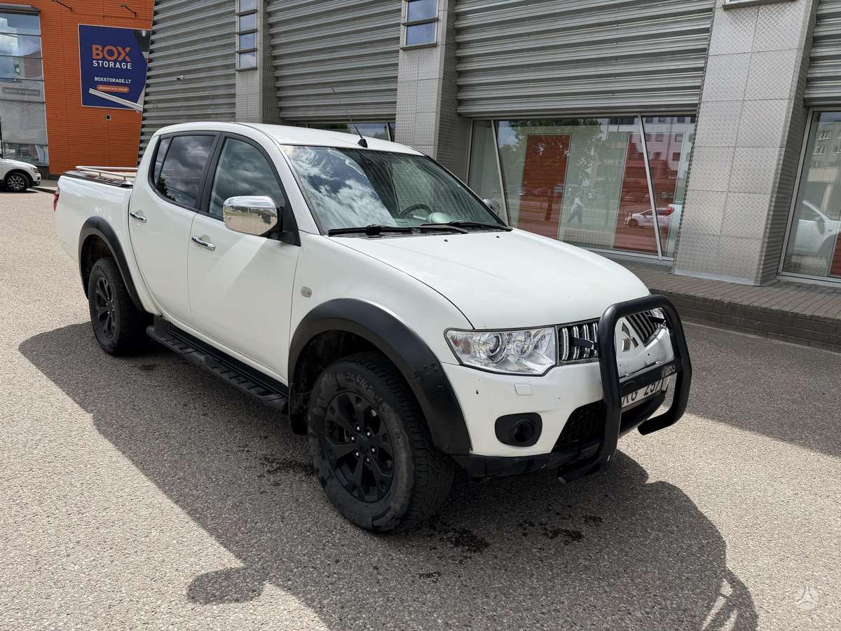 Mitsubishi L200 2012 — photo 12