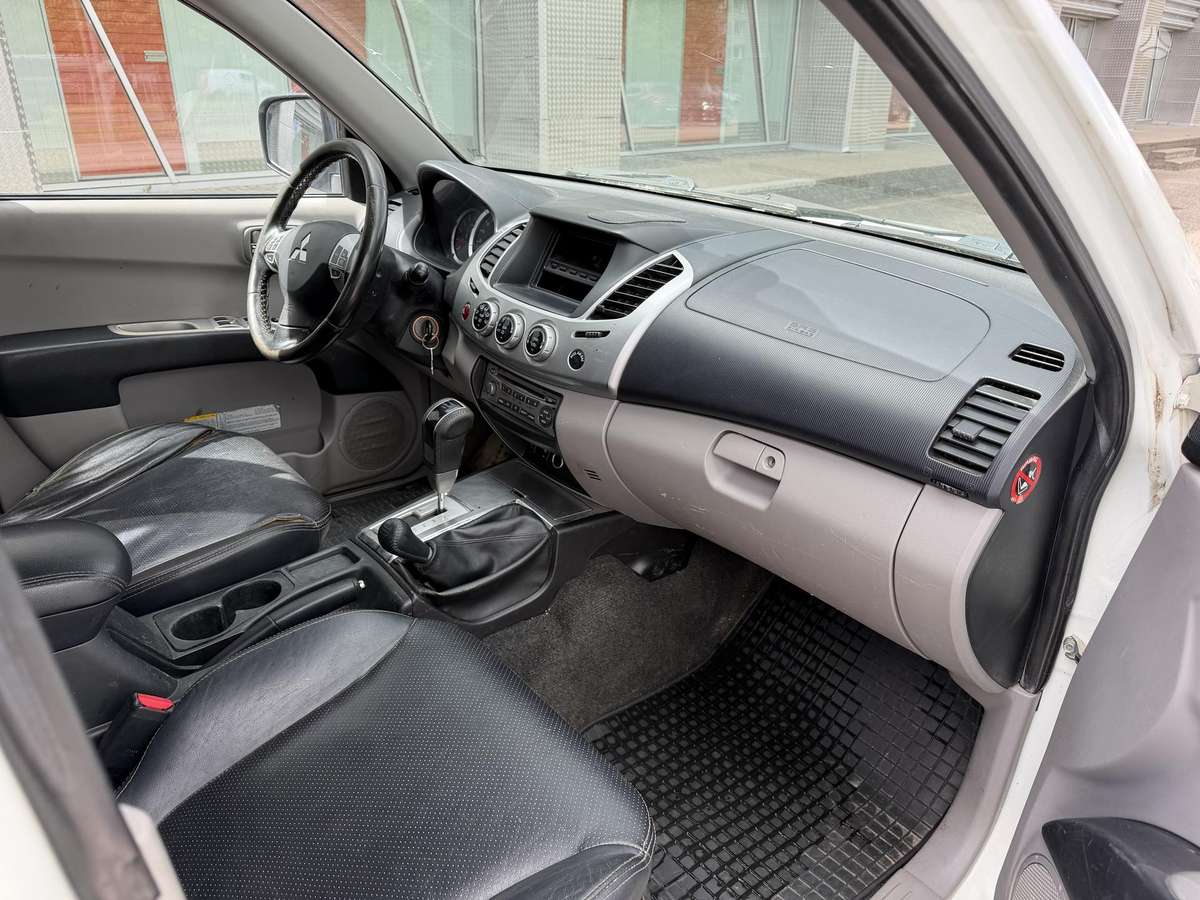 Mitsubishi L200 2012 — photo 13