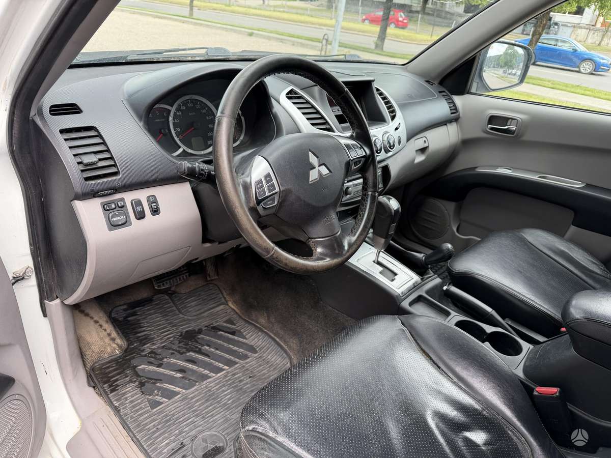 Mitsubishi L200 2012 — photo 15