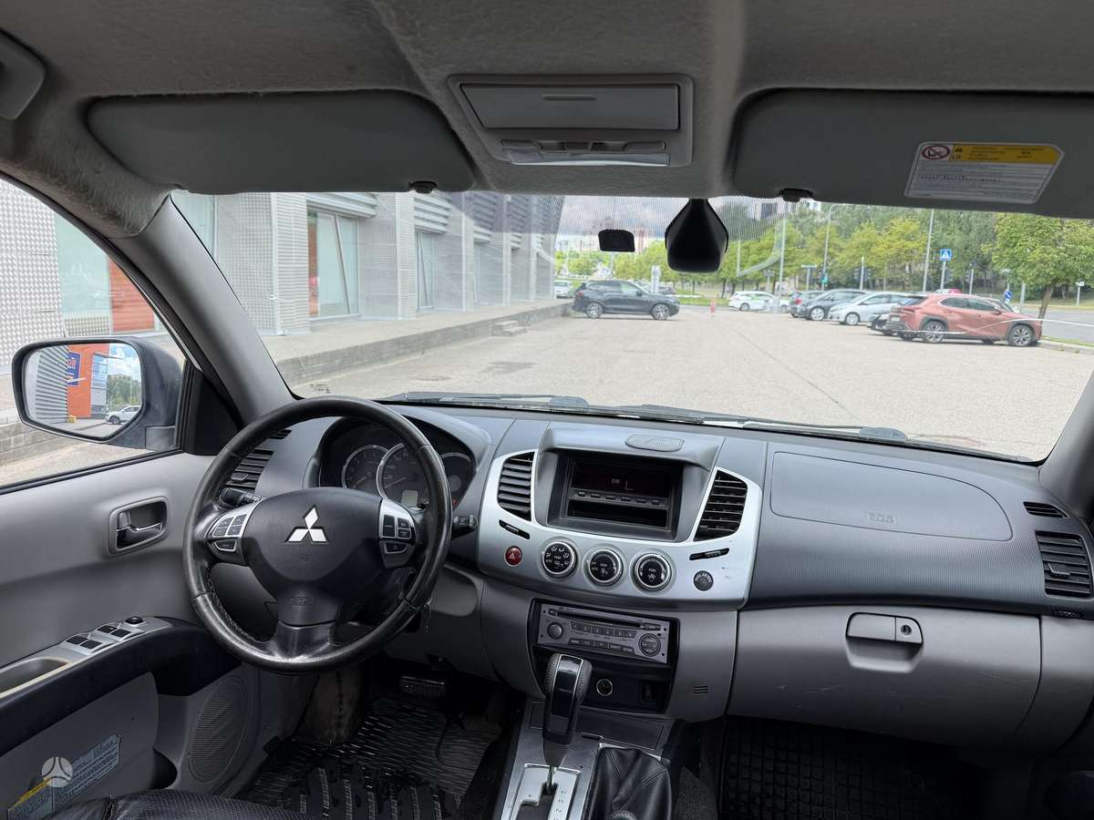 Mitsubishi L200 2012 — photo 16