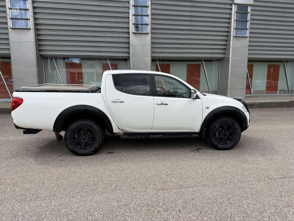 Mitsubishi L200 2012 — photo 6